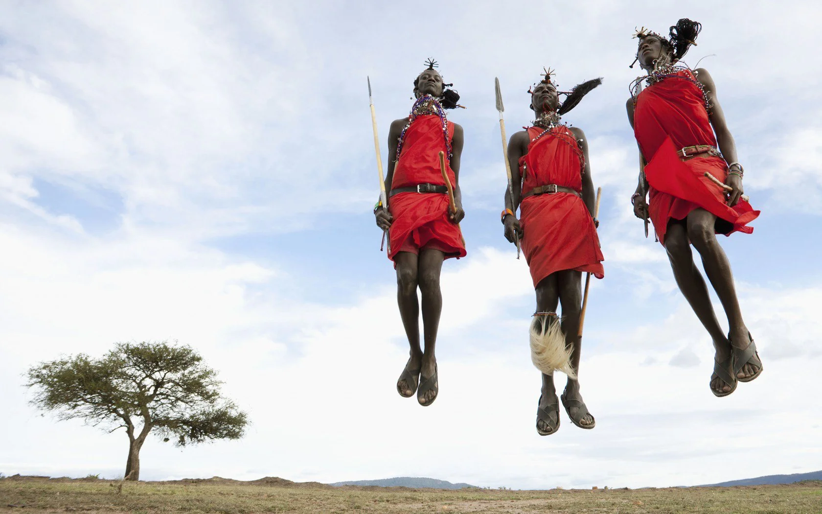 Elabush Safaris — Maasai warriors jumping Kenya